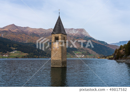 Church in the water at Lake Reschen in Tyrol in north Italy 49817582