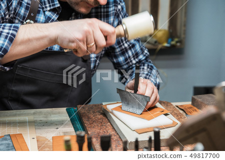 Concept of handmade craft production of leather goods. 49817700