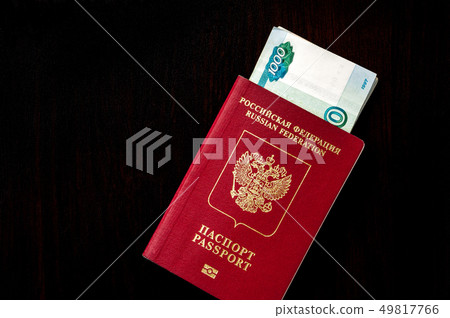 Russian passport and ruble banknotes. Russian passport and ruble banknotes. 49817766