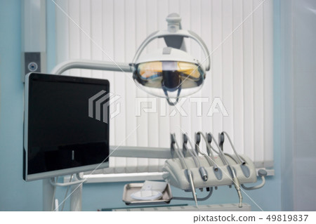 Dental treatment equipment with blur background. 49819837