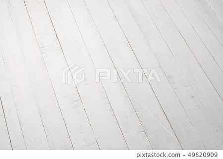 White wooden boards lie diagonally. Backgrounds White wooden boards lie diagonally. Backgrounds 49820909