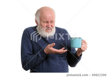 unhappy elderly man with cup of bad tea or coffee isolated on white 49821300