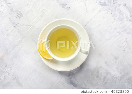 A photo of a cup of tea with lemon, shot from the top with copy space A photo of a cup of tea with lemon, shot from the top with copy space 49828800