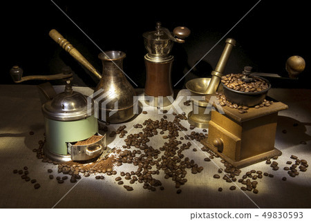 The photo was taken in the technique of Light brush . Mini-collection.On the table are coffee 49830593