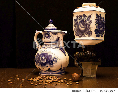 The photo was taken in the technique of Light brush . Mini-collection.On the table are a coffee 49830597