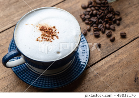 Capucino Coffee with Coffee Beans. Capucino Coffee with Coffee Beans. 49832170