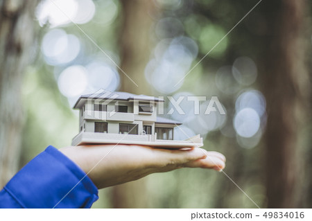 House model and green blur background House model and green blur background 49834016