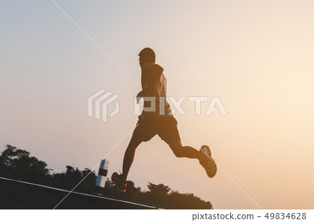 runner running on running road in city runner running on running road in city 49834628