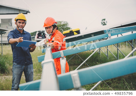 engineer in solar power plant  49835796