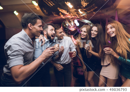 Young people have fun in a nightclub. Young people have fun in a nightclub. 49836793