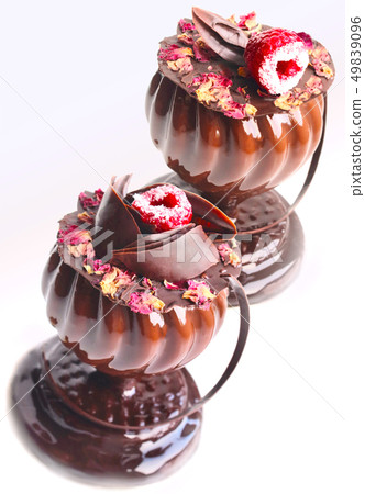 Glass shaped desserts with rose petals and Glass shaped desserts with rose petals and 49839096
