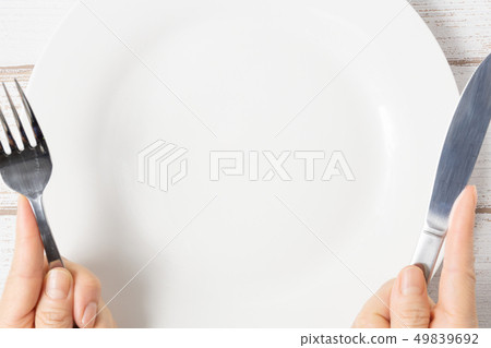 Dishes and cutlery 49839692