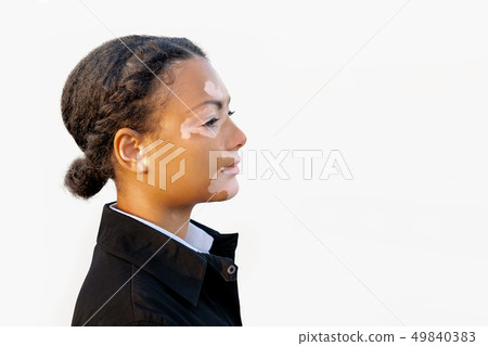 A beautiful young girl of African ethnicity with A beautiful young girl of African ethnicity with 49840383