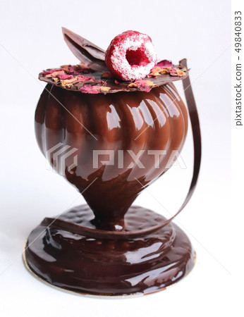 Glass shaped dessert with rose petals and Glass shaped dessert with rose petals and 49840833