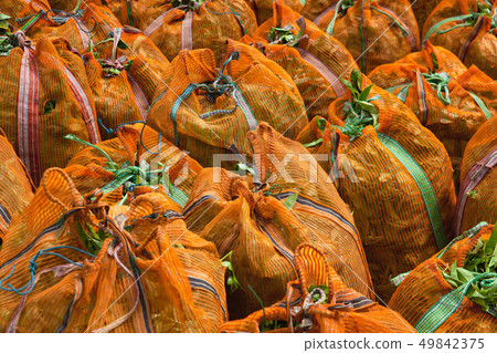 The green tea leaves in sacks on Nuwara Eliya  49842375