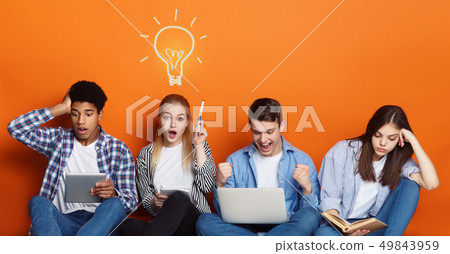 Genius. Students preparing for exams over studio background 49843959