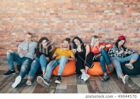millennials sitting resting lounge zone bored millennials sitting resting lounge zone bored 49844570