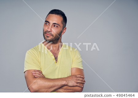 Closeup of casual hispanic man looking at camera 49845464