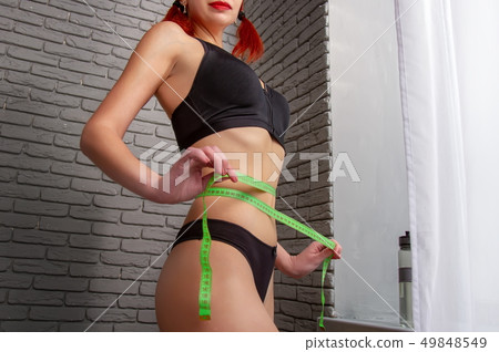 the girl measures the girl measures 49848549