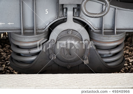 Train wheel close-up with large spring Train wheel close-up with large spring 49848966