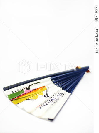 Folding fan on white background. 49849773