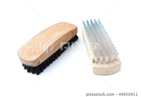 Old shoe brush isolated on white background Old shoe brush isolated on white background 49850911