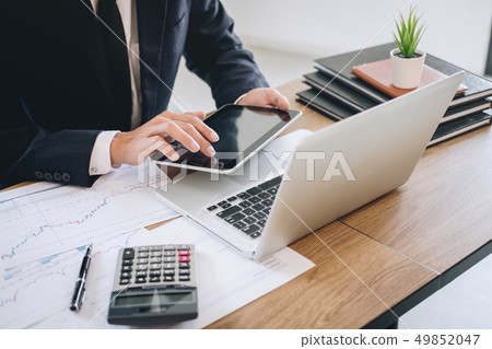 Businessman working new project on laptop computer 49852047