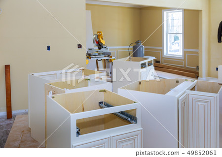 Installing new modern kitchen of installation base 49852061