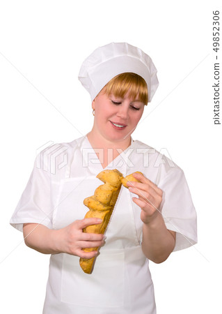 woman baker checks the quality of the loaf 49852306