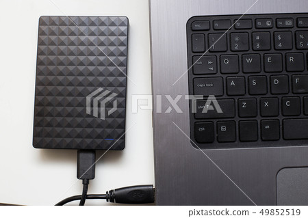 External hard drive connect to laptop computer, transfer or backup data between laptop and hard disk 49852519