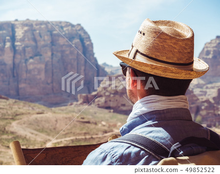 Tourist in a city of Petra in Jordan Tourist in a city of Petra in Jordan 49852522