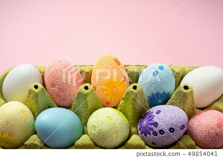 Easter eggs on a beautiful pink background 49854041