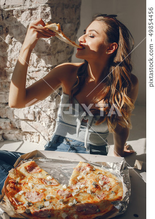 Cute girl with pizza Cute girl with pizza 49854456