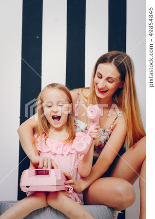 Mother and daughter  49854846