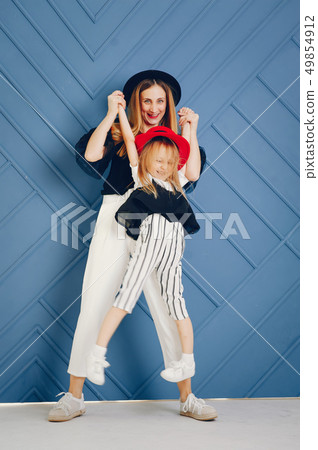 Mother and daughter  49854912