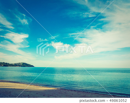 Beautiful tropical beach and sea with coconut palm tree Beautiful tropical beach and sea with coconut palm tree 49861052