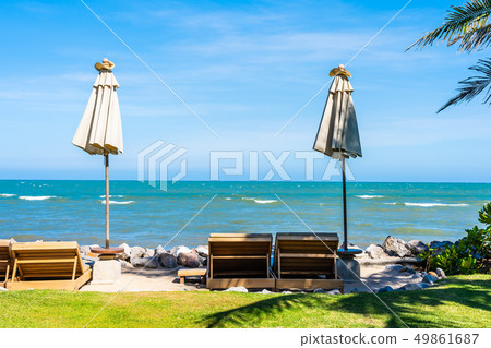 Beautiful outdoor nature landscape with bed deck chair around swimming pool in hotel resort Beautiful outdoor nature landscape with bed deck chair around swimming pool in hotel resort 49861687