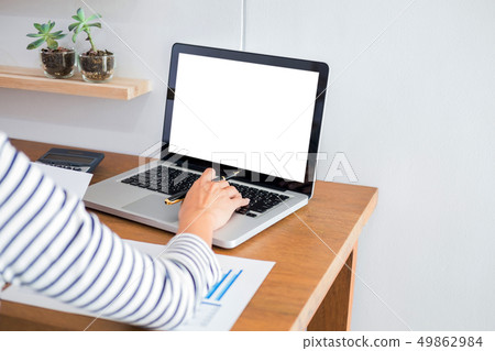 business man working on a laptop tablet and graph 49862984