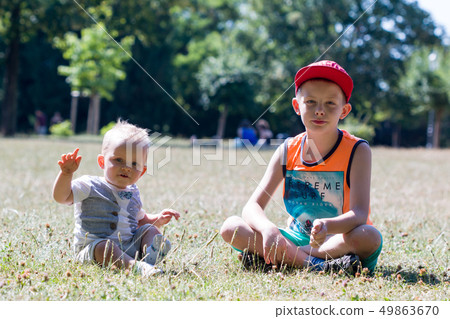 Happy and friendly brothers during the game. Positive emotions and energy 49863670