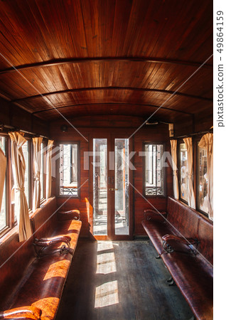 Old classic train wooden interior with curtain Old classic train wooden interior with curtain 49864159