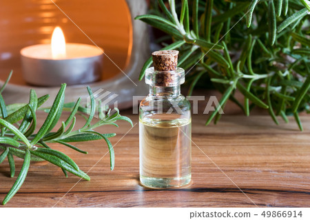 A bottle of rosemary essential oil  49866914