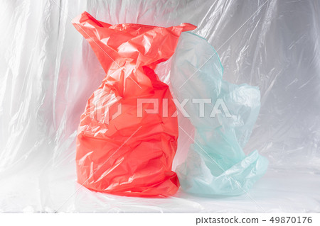 Transparent crumpled trash bags overloading oceans and polluting planet 49870176