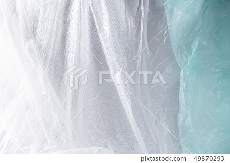 Studio walls covered in protective pimpled plastic material 49870293