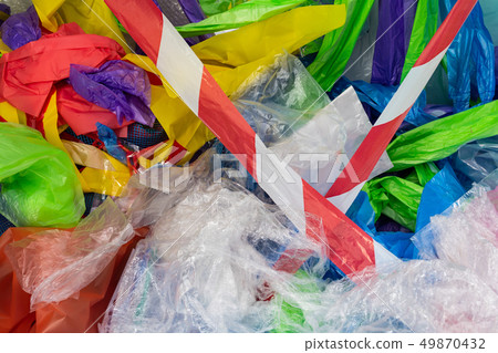 Sad amount of plastic packages and bags being used and thrown 49870432