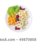 Cheese plate served with grapes and lettuce. Top view 49870808