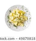 Sliced boiled potatoes on a plate, isolated on white background. Top view. 49870818
