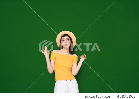 Cute young girl with puzzlement on face Cute young girl with puzzlement on face 49870862
