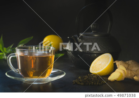 Cup of tea, ginger on dark. Chinese tea concept. 49871038