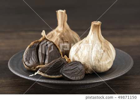 Black garlic up Black garlic up 49871150
