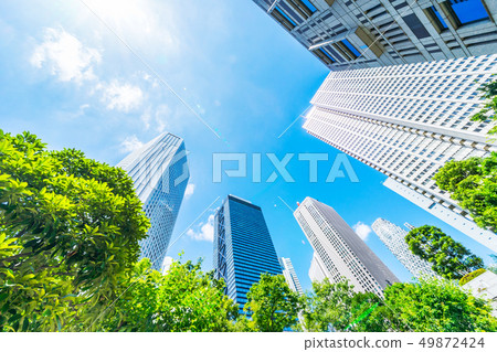 looking up view of city skyline in tokyo, japan looking up view of city skyline in tokyo, japan 49872424